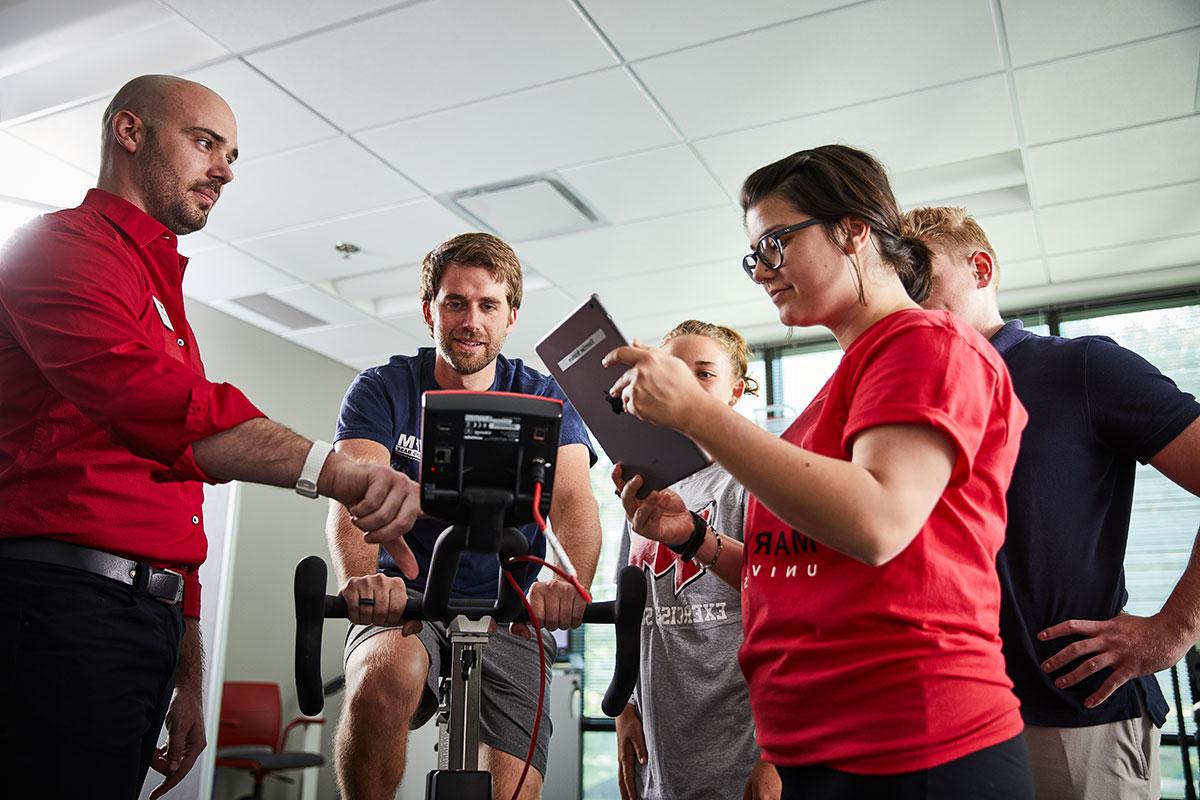 students in an exercise lab